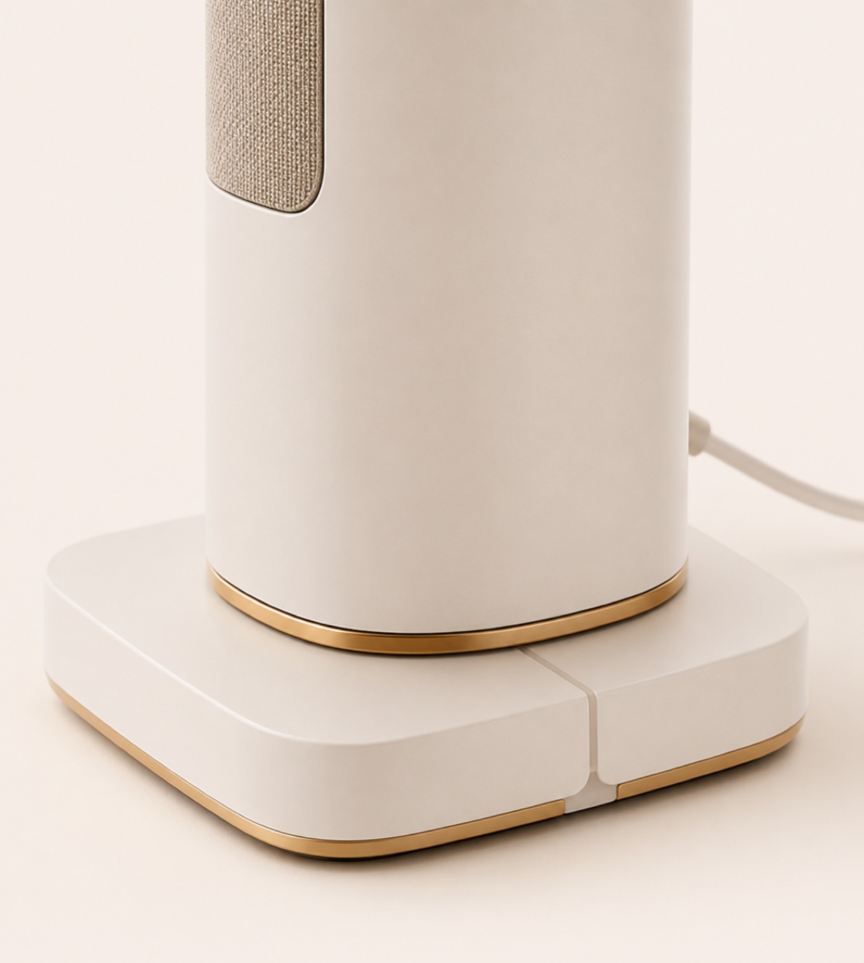 The low, weighted, anti-slip base of the Welyna unit with its power cord